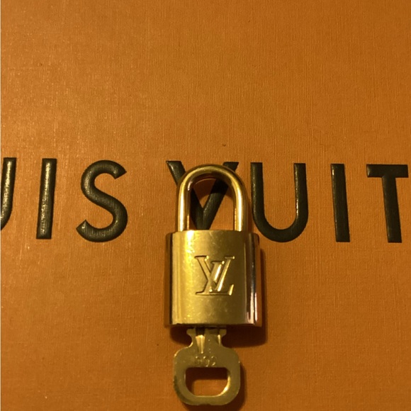 Authentic Louis Vuitton Padlock & key - Picture 2 of 2